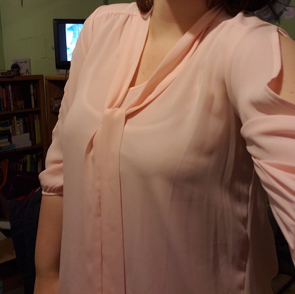 Pink blouse with open arms